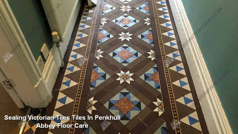 Restored Victorian hallway tiles in Penkhull after breathable sealing with richer colour and matte finish